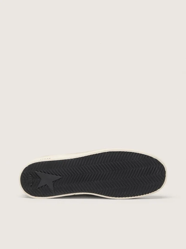 Modèle Stardan pour homme en daim bleu poudre avec étoile et languette de talon en cuir vert