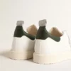 Modèle Starter d’origine bio avec languette de talon en cuir vert