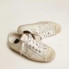 Modèle V-Star pour homme en cuir blanc avec une étoile blanche et une bande bleu clair sur le renfort