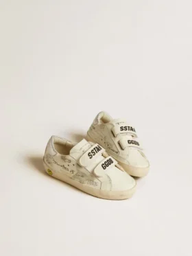 Old School Junior avec étoile en daim et languette de talon en cuir métallisé