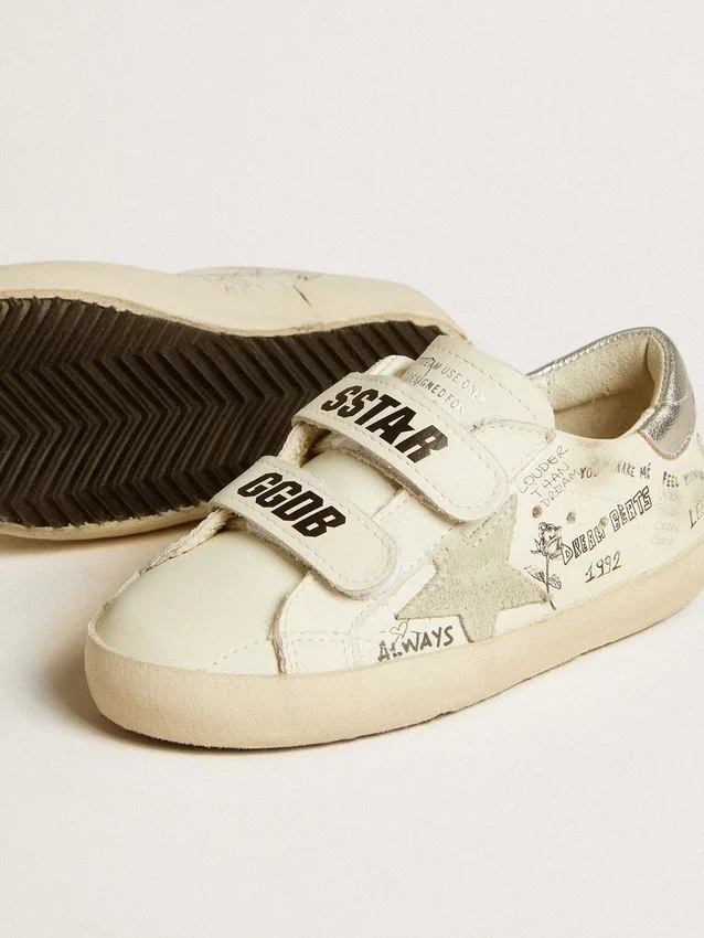 Old School Junior avec étoile en daim et languette de talon en cuir métallisé