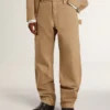 Pantalon beige pour homme avec empiècements