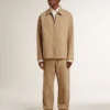Pantalon beige pour homme avec empiècements