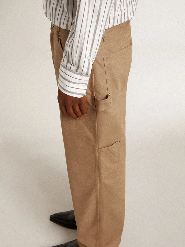 Pantalon beige pour homme avec empiècements