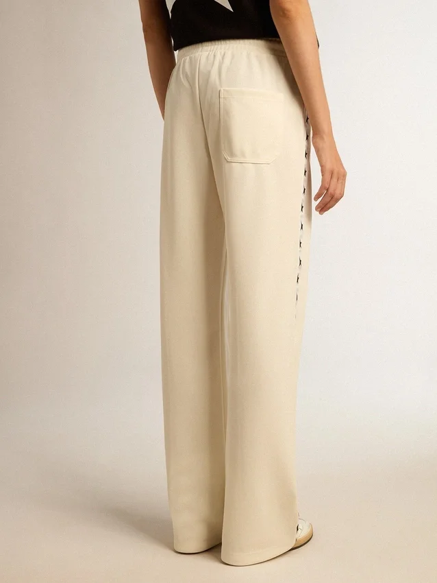 Pantalon de jogging blanc pour femme avec des étoiles sur les côtés