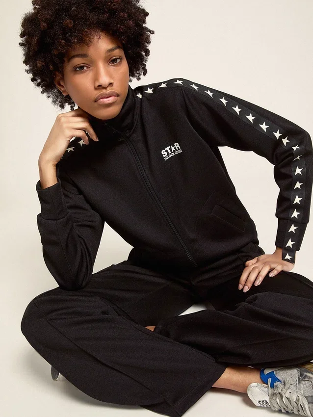 Pantalon de jogging noir pour femme avec des étoiles blanches sur les côtés