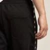 Pantalon de jogging noir pour homme avec des étoiles blanches sur les côtés