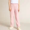 Pantalon de jogging rose avec une étoile pailletée sur le devant