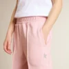 Pantalon de jogging rose avec une étoile pailletée sur le devant