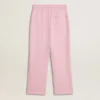 Pantalon de jogging rose avec une étoile pailletée sur le devant