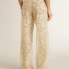 Pantalon en dentelle transparente couleur crème pour femme