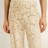 Pantalon en dentelle transparente couleur crème pour femme