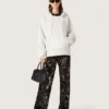 Pantalon en tulle pour femme avec broderie florale en paillettes noires