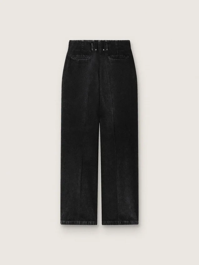 Pantalon pour femme en denim de coton noir avec un effet usé