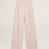 Pantalon pour femme en laine rose de coupe ajustée