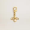 Pendentif en forme d’abeille en laiton doré avec des cristaux