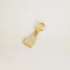 Pendentif en forme de cadenas en laiton doré orné de cristaux