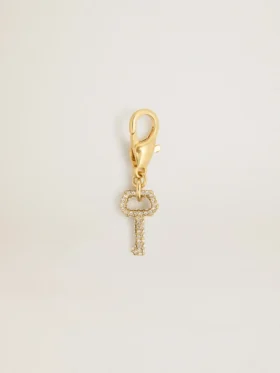 Pendentif en forme de clé en laiton doré orné de cristaux
