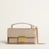 Petit sac Venezia en cuir beige à nervures avec détails dorés