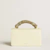 Petit sac Venezia en cuir gaufré couleur beurre avec foulard tressé