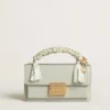 Petit sac Venezia en cuir grainé gris minéral avec détails dorés