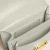 Petit sac Venezia en cuir grainé gris minéral avec détails dorés