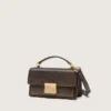 Petit sac Venezia en cuir marron foncé avec boucle dorée