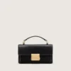 Petit sac Venezia en cuir noir gaufré avec détails dorés