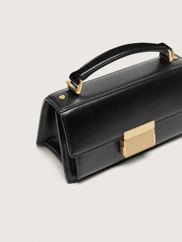 Petit sac Venezia en cuir noir gaufré avec détails dorés