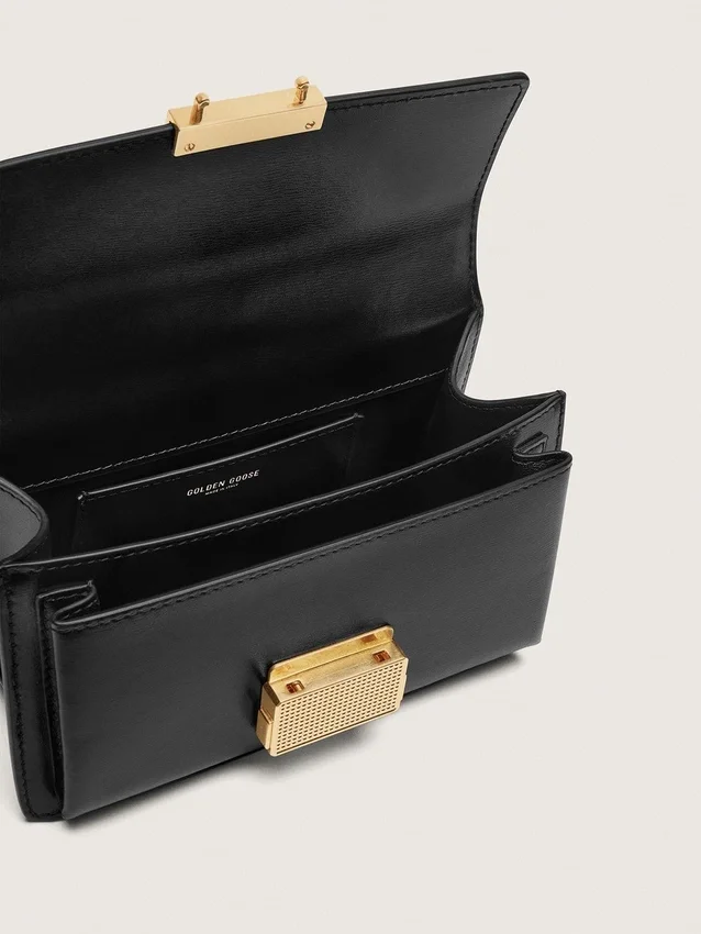 Petit sac Venezia en cuir noir gaufré avec détails dorés