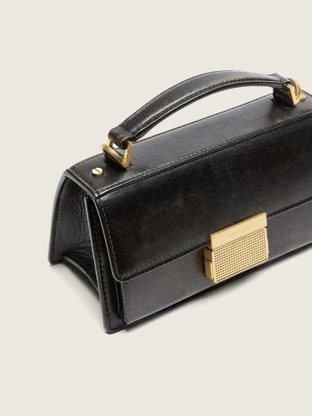 Petit sac Venezia en cuir noir vieilli avec détails dorés