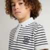 Polo blanc en coton pour garçons avec rayures bleu marine et broderie