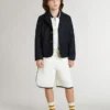 Polo sweat-shirt blanc en coton pour enfant avec broderie sur la poitrine et imprimé dans le dos