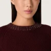 Pull à col rond pour femme en laine bordeaux avec broderie en strass