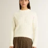 Pull à col rond pour femme en laine mérinos blanche entièrement recouvert de cristaux