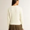 Pull à col rond pour femme en laine mérinos blanche entièrement recouvert de cristaux