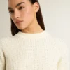 Pull à col rond pour femme en laine mérinos blanche entièrement recouvert de cristaux