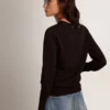 Pull à col rond pour femme en laine noire