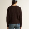 Pull à col rond pour femme en mélange de laine avec boutons dorés