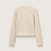 Pull court à col rond en laine beige entièrement orné de cristaux