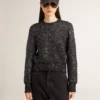 Pull court noir pour femme en mélange de laine, entièrement recouvert de paillettes