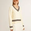 Pull court pour femme à motif torsadé, avec bords-côtes bleus et cristaux
