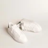 Purestar avec étoile blanche d’origine biologique et languette de talon en cuir vert mat