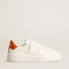 Purestar pour femme avec étoile en cuir blanc et languette de talon orange