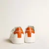 Purestar pour homme avec étoile en cuir blanc et languette de talon orange