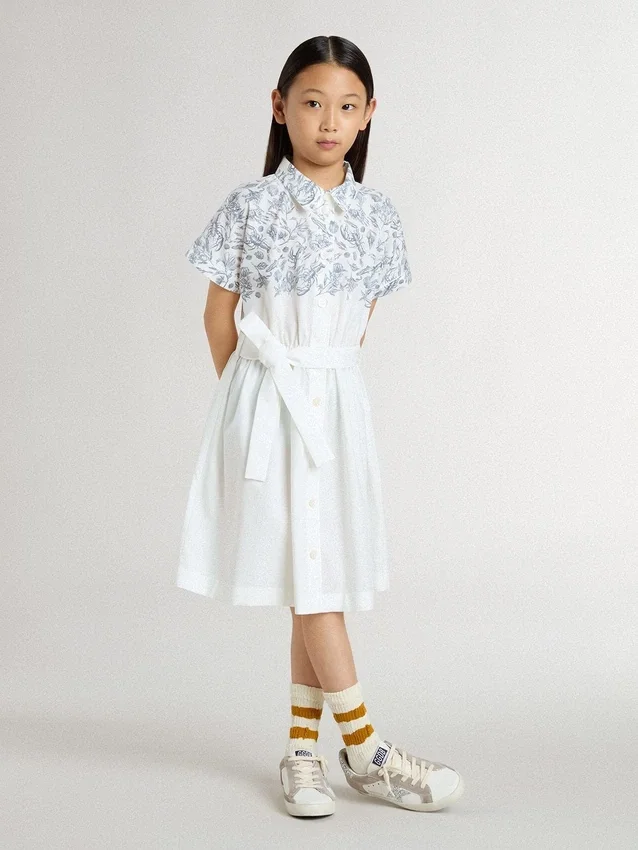 Robe-chemise pour fille en toile de coton blanche avec un imprimé nautique bleu et un passepoil blanc