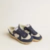 Running Sole en mesh crème et cuir bleu, ornée d’une étoile en cuir blanc