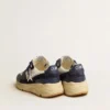 Running Sole en mesh crème et cuir bleu, ornée d’une étoile en cuir blanc