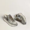 Running Sole pour homme en nylon bleu clair avec étoile noire et languette de talon en cuir vert