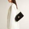 Sac Gioia en cuir noir rigide avec détails dorés
